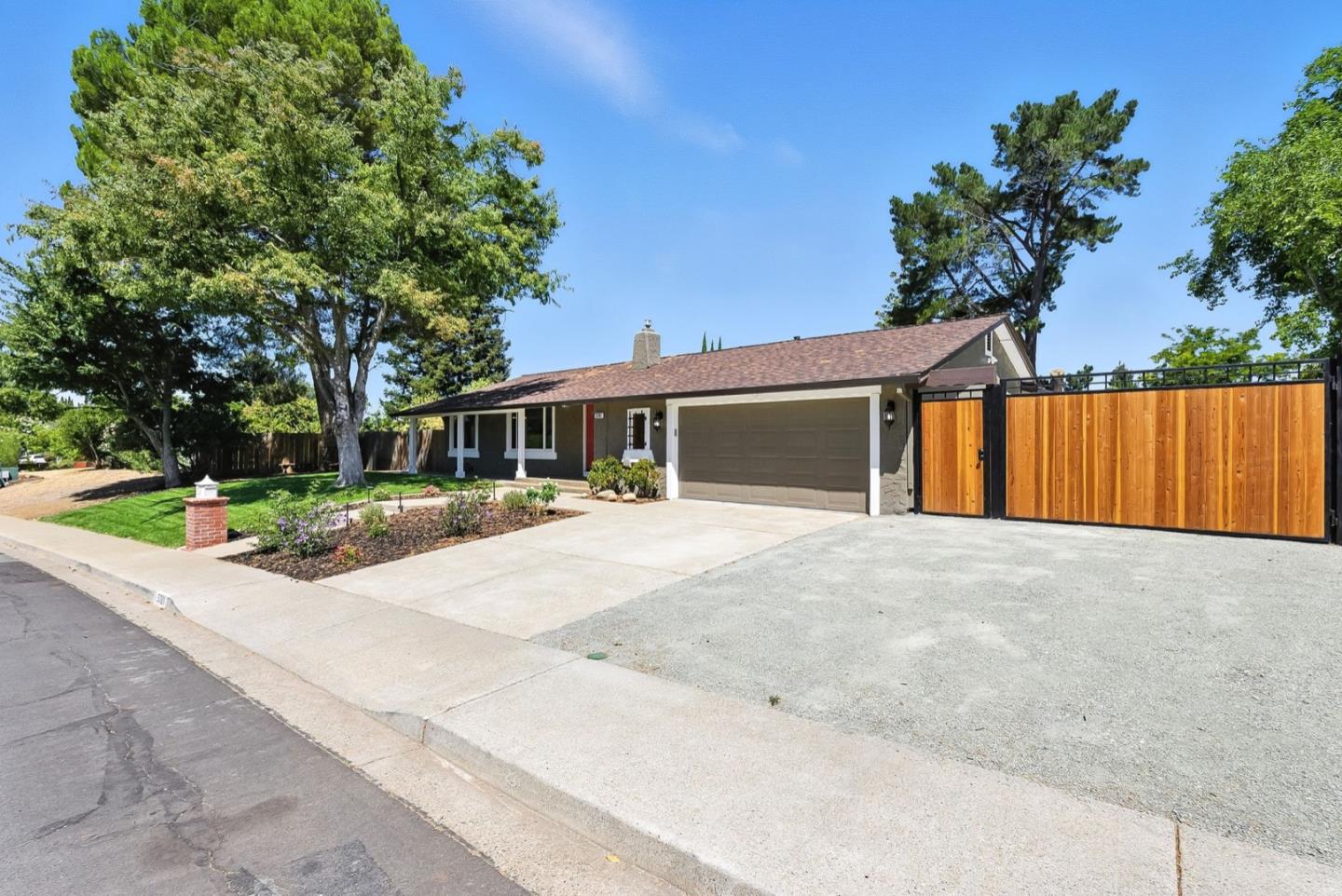 5701 Lewis Way Concord, CA 94521 - Photo 3 of 54 front view of a house with a yard and potted plants