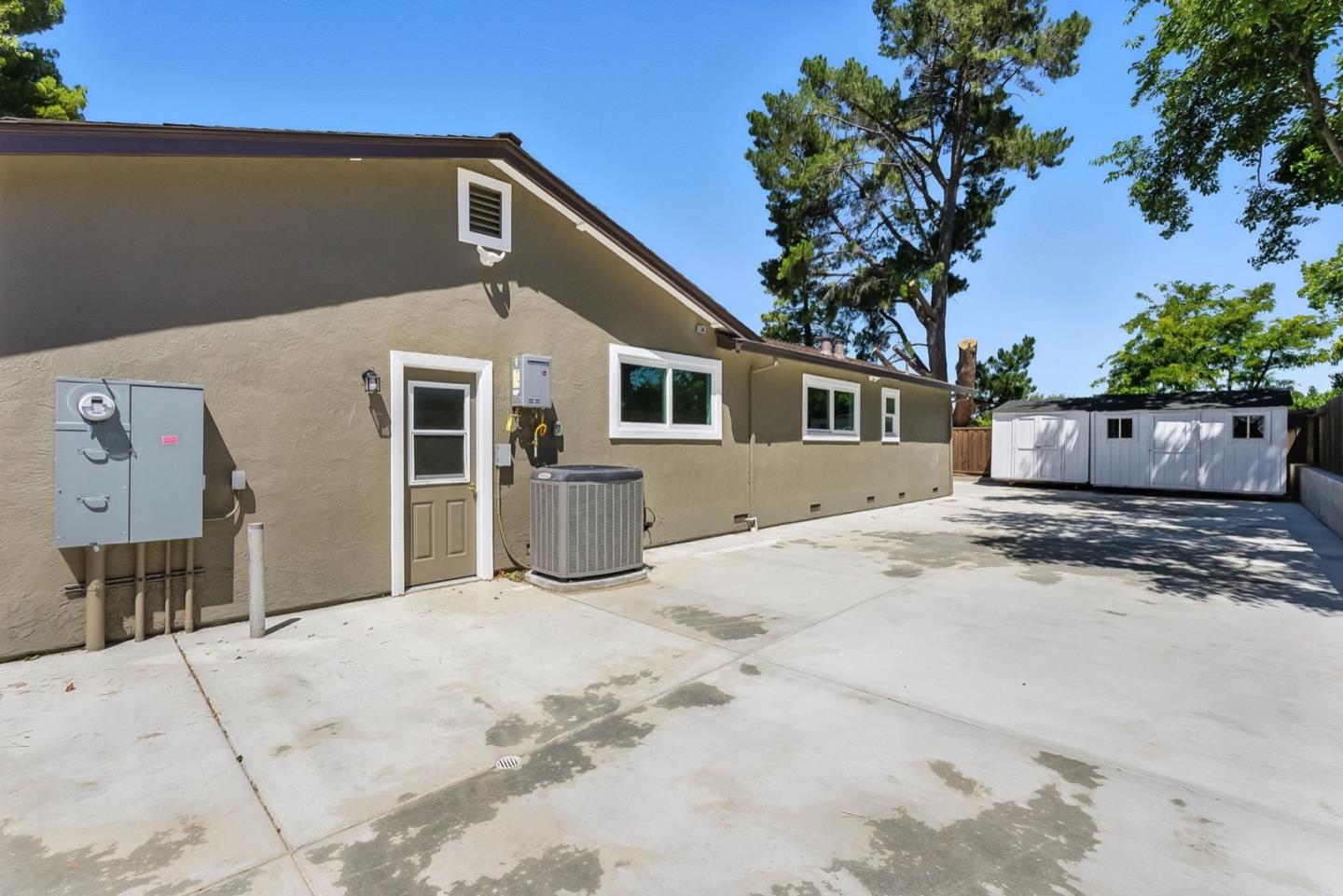 5701 Lewis Way Concord, CA 94521 - Photo 35 of 54 a front view of a house with a garage