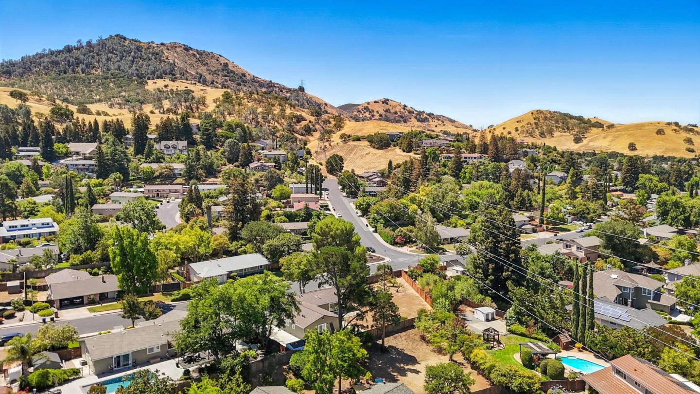 5701 Lewis Way Concord, CA 94521 - Photo 44 of 54 a view of a large building with a mountain in the background