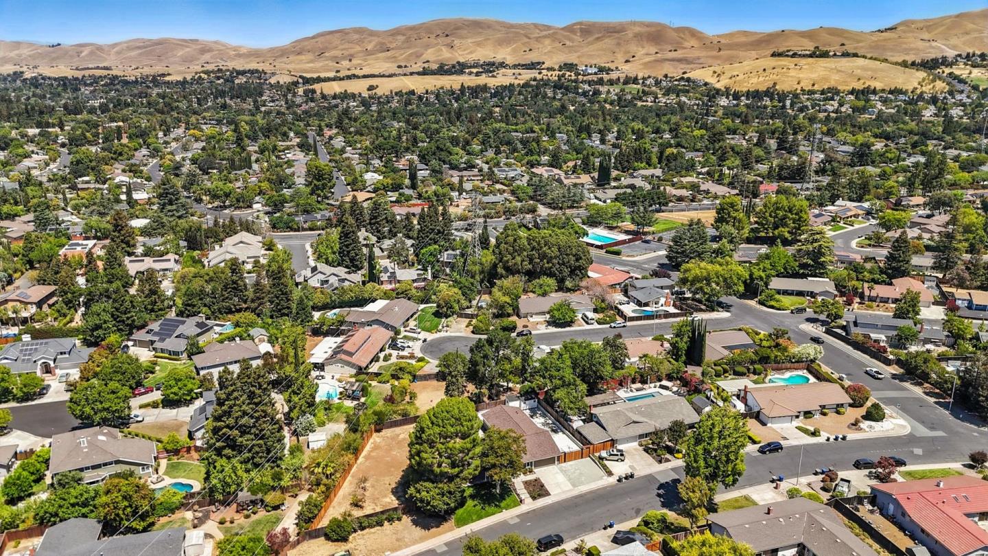 5701 Lewis Way Concord, CA 94521 - Photo 46 of 54 an aerial view of residential houses with city and mountain view in back