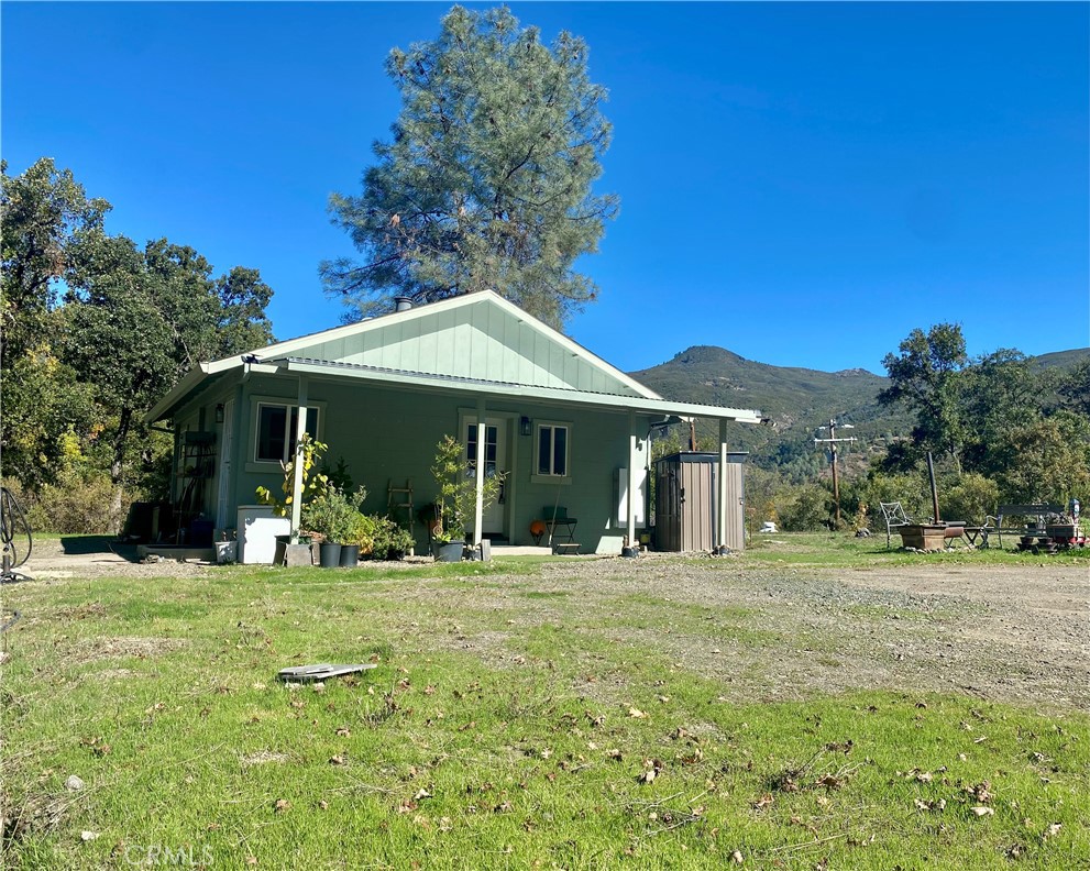 11255 Rancheria Road Upper Lake, CA 95485 - Photo 11 of 46 a front view of a house with a yard