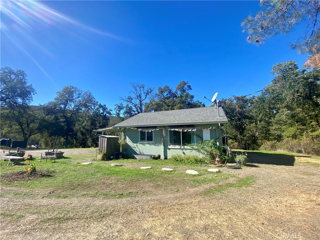 11255 Rancheria Road Upper Lake, CA 95485 - Photo 12 of 46 a front view of a house with garden