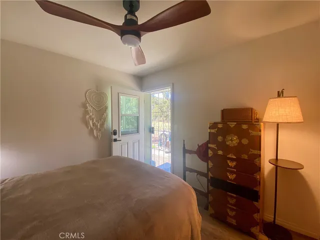 a view of a hallway with the view of the house