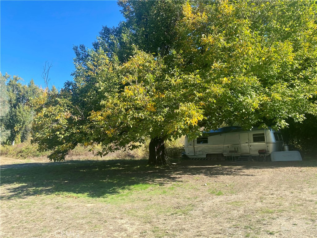 11255 Rancheria Road Upper Lake, CA 95485 - Photo 27 of 46 a view of a house with a yard