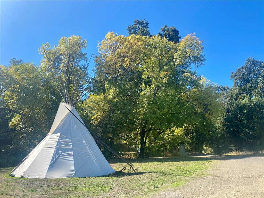 11255 Rancheria Road Upper Lake, CA 95485 - Photo 28 of 46 a view of a yard with an outdoor space