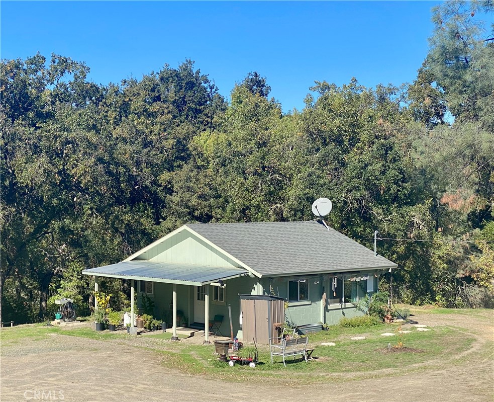11255 Rancheria Road Upper Lake, CA 95485 - Photo 44 of 46 a front view of a house with garden