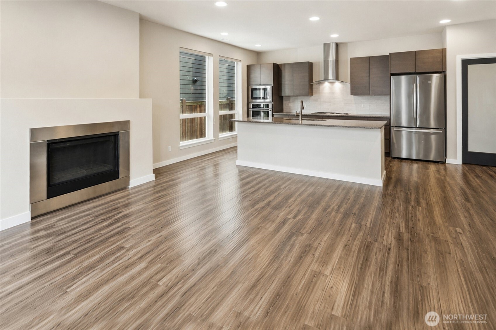 17227 39th Drive Southeast Bothell, WA 98012 - Photo 1 of 22 a view of kitchen with wooden floor and a refrigerator