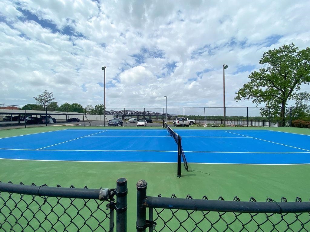 655 Riverside Drive, Unit 904B Memphis, TN 38103 - Photo 30 of 39 a view of a tennis court