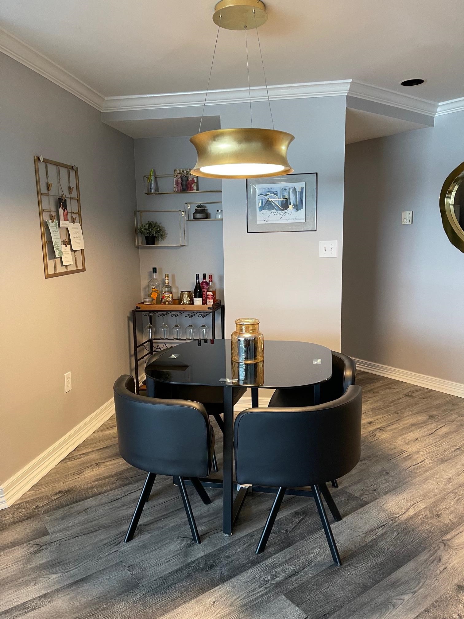 655 Riverside Drive, Unit 904B Memphis, TN 38103 - Photo 9 of 39 a dining room with furniture and window
