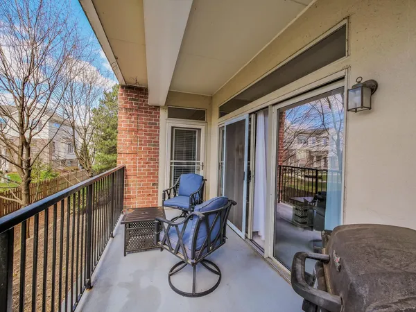 a view of a porch with chairs