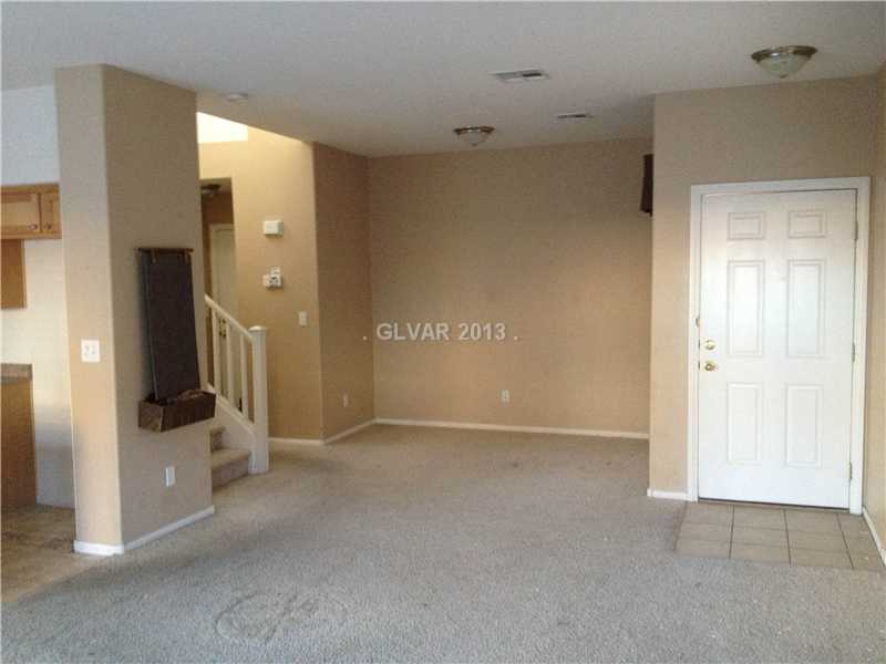 9468 Plover Falls Avenue Las Vegas, NV 89149 - Photo 3 of 10 Living Room.
