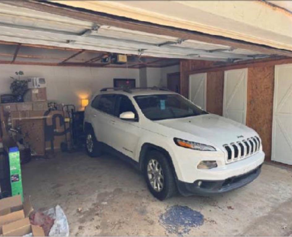 4415 Smallwood Road Reno, TX 75462 - Photo 13 of 39 a view of car garage