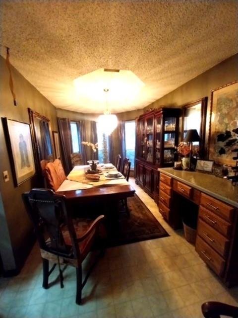 4415 Smallwood Road Reno, TX 75462 - Photo 14 of 39 a kitchen with a sink appliances and a counter top space