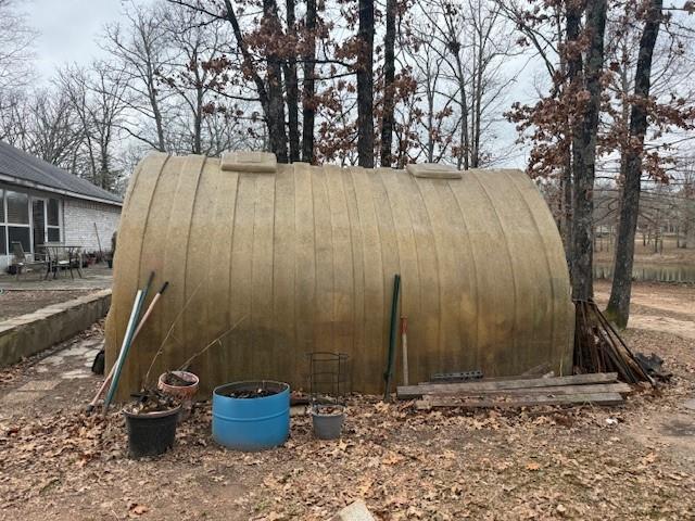 4415 Smallwood Road Reno, TX 75462 - Photo 28 of 39 a view of outdoor space and tall trees