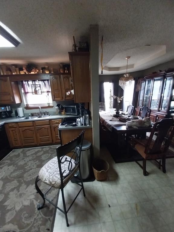 4415 Smallwood Road Reno, TX 75462 - Photo 35 of 39 a kitchen with sink and stove