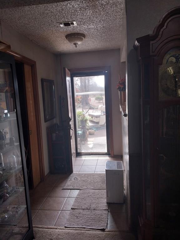 4415 Smallwood Road Reno, TX 75462 - Photo 10 of 39 a view of entryway with a hallway