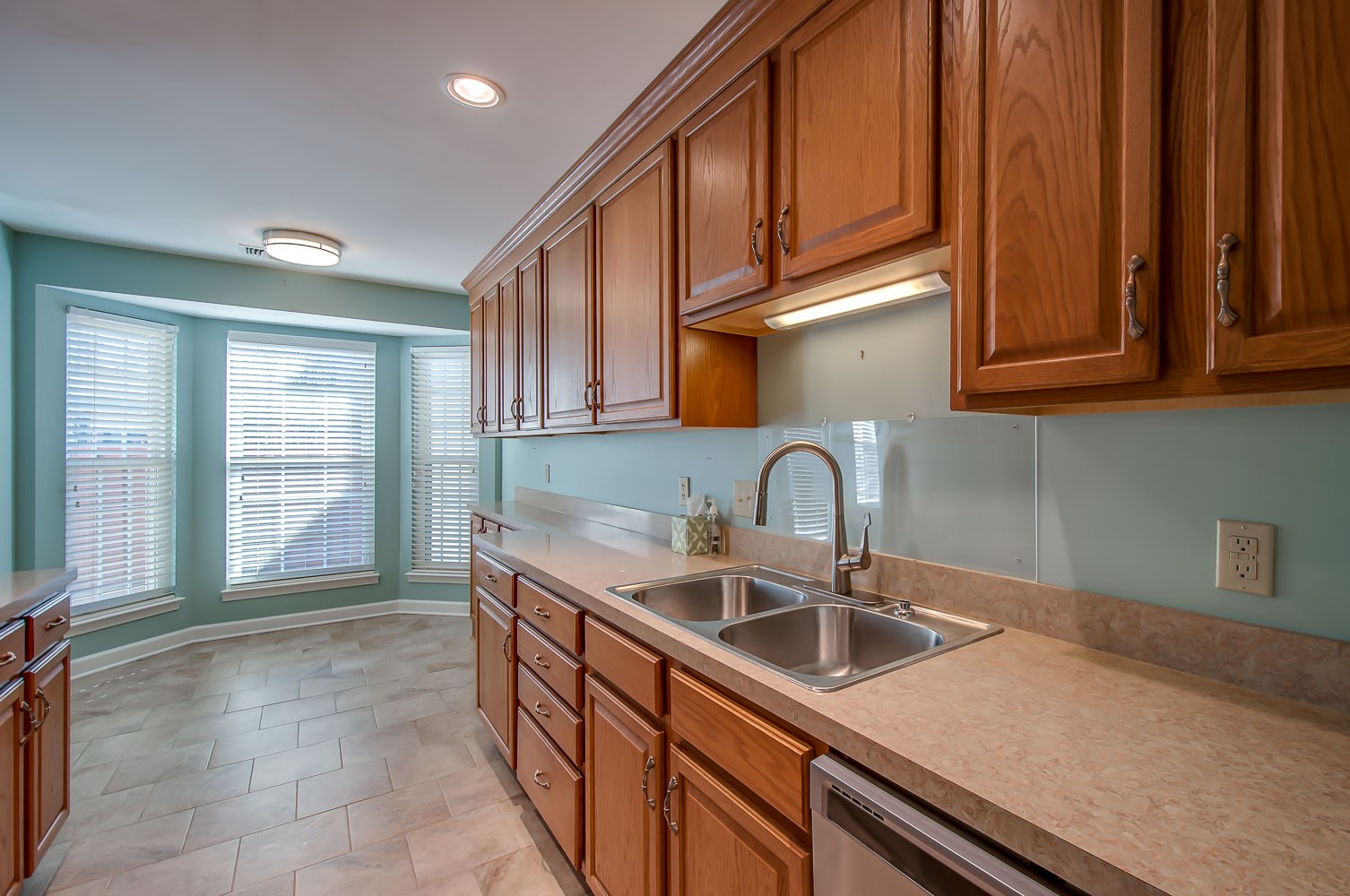 1307 General George Patton Road Nashville, TN 37221 - Photo 14 of 31 a kitchen with a sink cabinets and window
