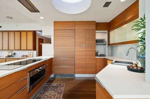 a view of living room with granite countertop furniture and fireplace