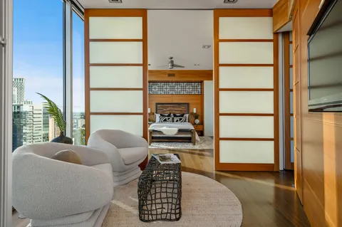 a living room with furniture and a window