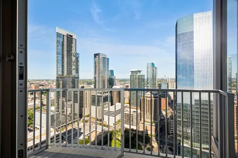 a view of a balcony with city view