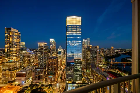 a view of a city and ocean view