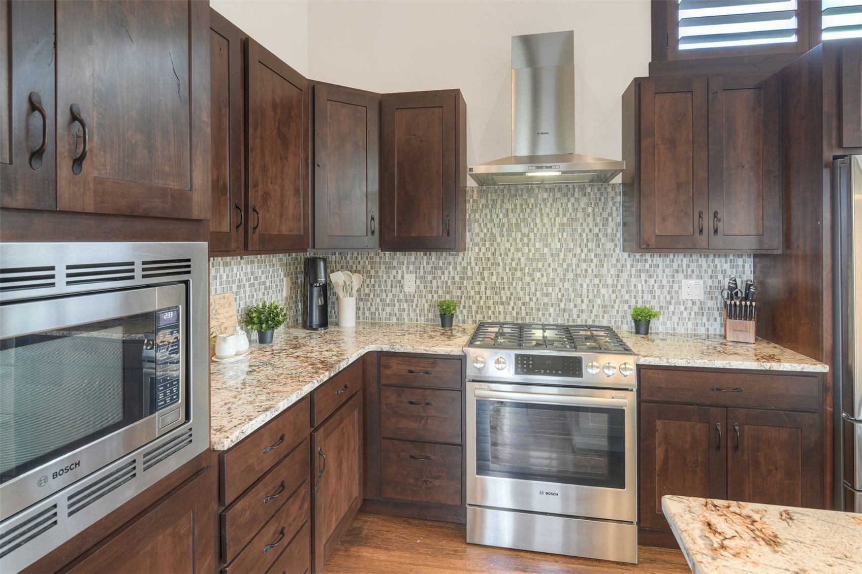 21 Moss Way Silverthorne, CO 80498 - Photo 14 of 50 a kitchen with a sink stove and microwave