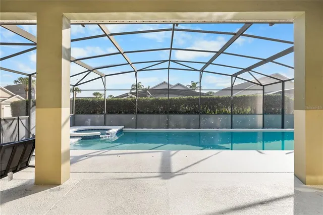 a view of a building with a swimming pool