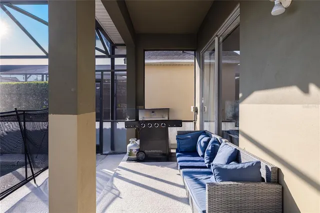 an aerial view of residential houses with outdoor space and street view