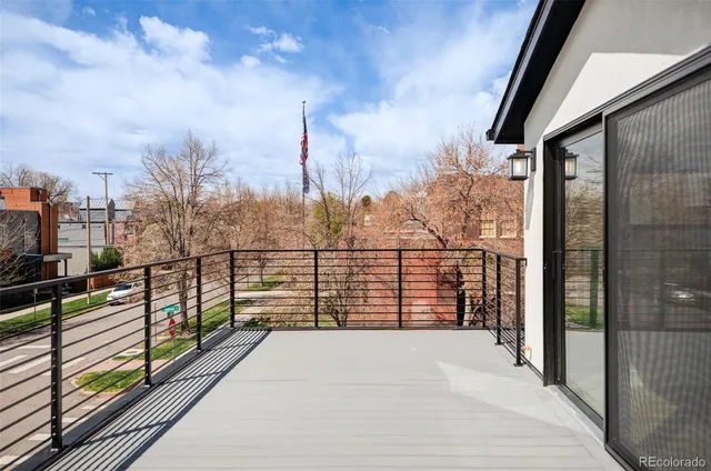 a view of a balcony with city view
