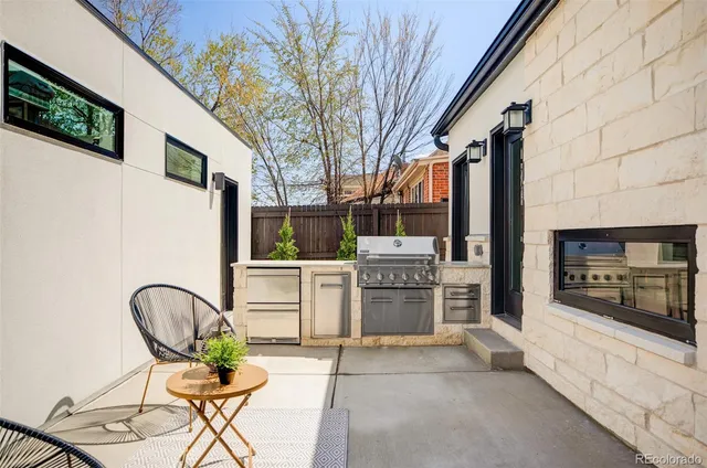 a view of a dinning room with furniture and fire pit
