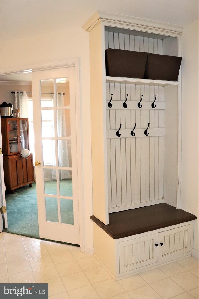 Built in Bench & Pegs / French Doors