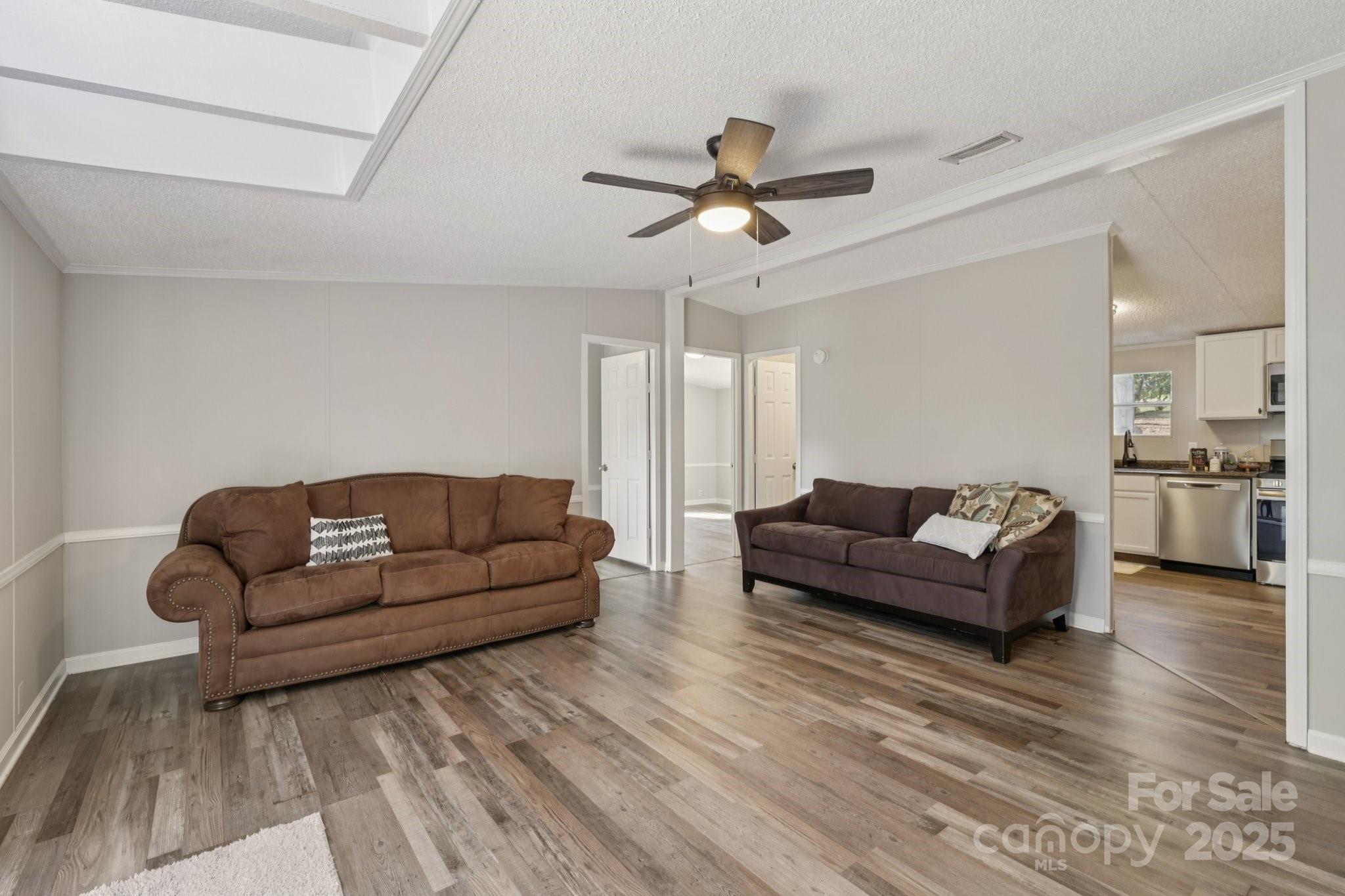 1269 Eastcreek Road Fort Lawn, SC 29714 - Photo 15 of 44 a living room with furniture and a wooden floor