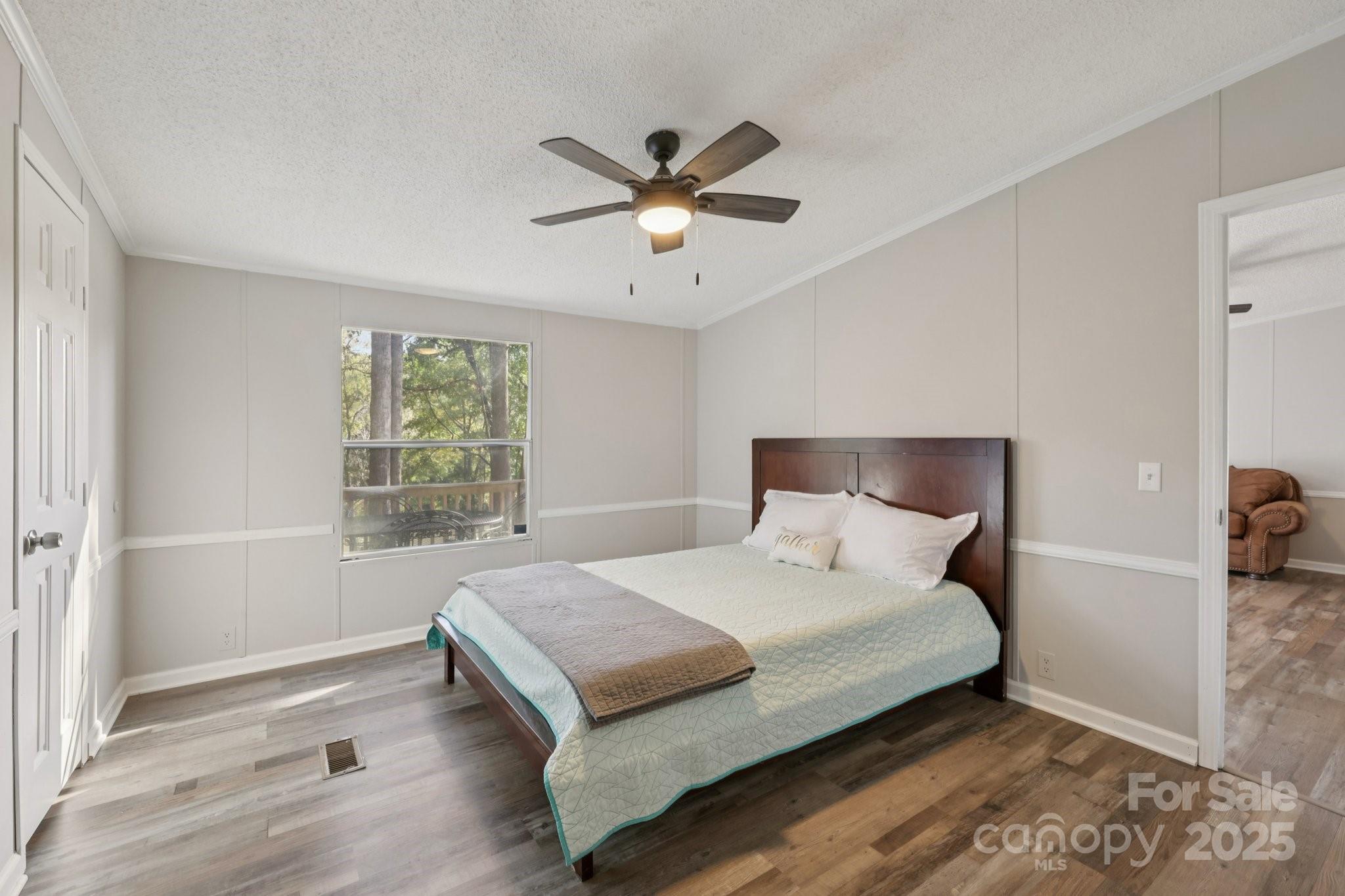 1269 Eastcreek Road Fort Lawn, SC 29714 - Photo 17 of 44 a bedroom with a bed and window