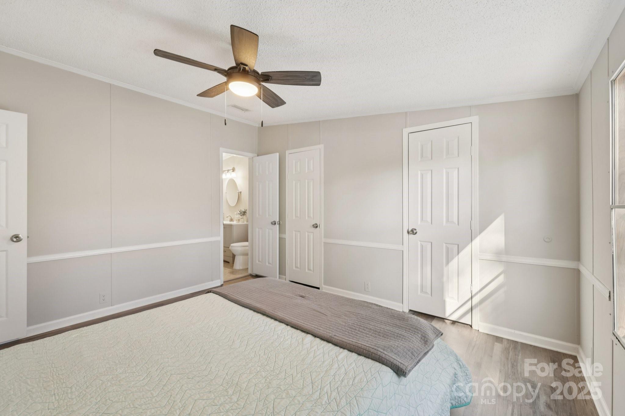 1269 Eastcreek Road Fort Lawn, SC 29714 - Photo 18 of 44 a bedroom with a bed and a ceiling fan
