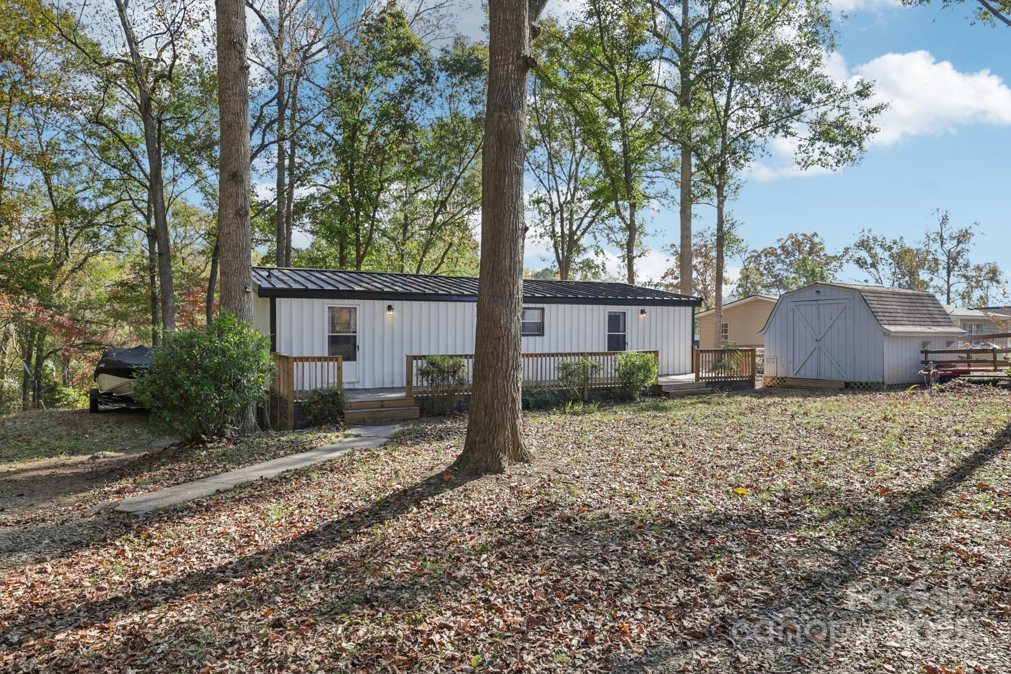 1269 Eastcreek Road Fort Lawn, SC 29714 - Photo 2 of 44 a backyard of a house with lots of green space