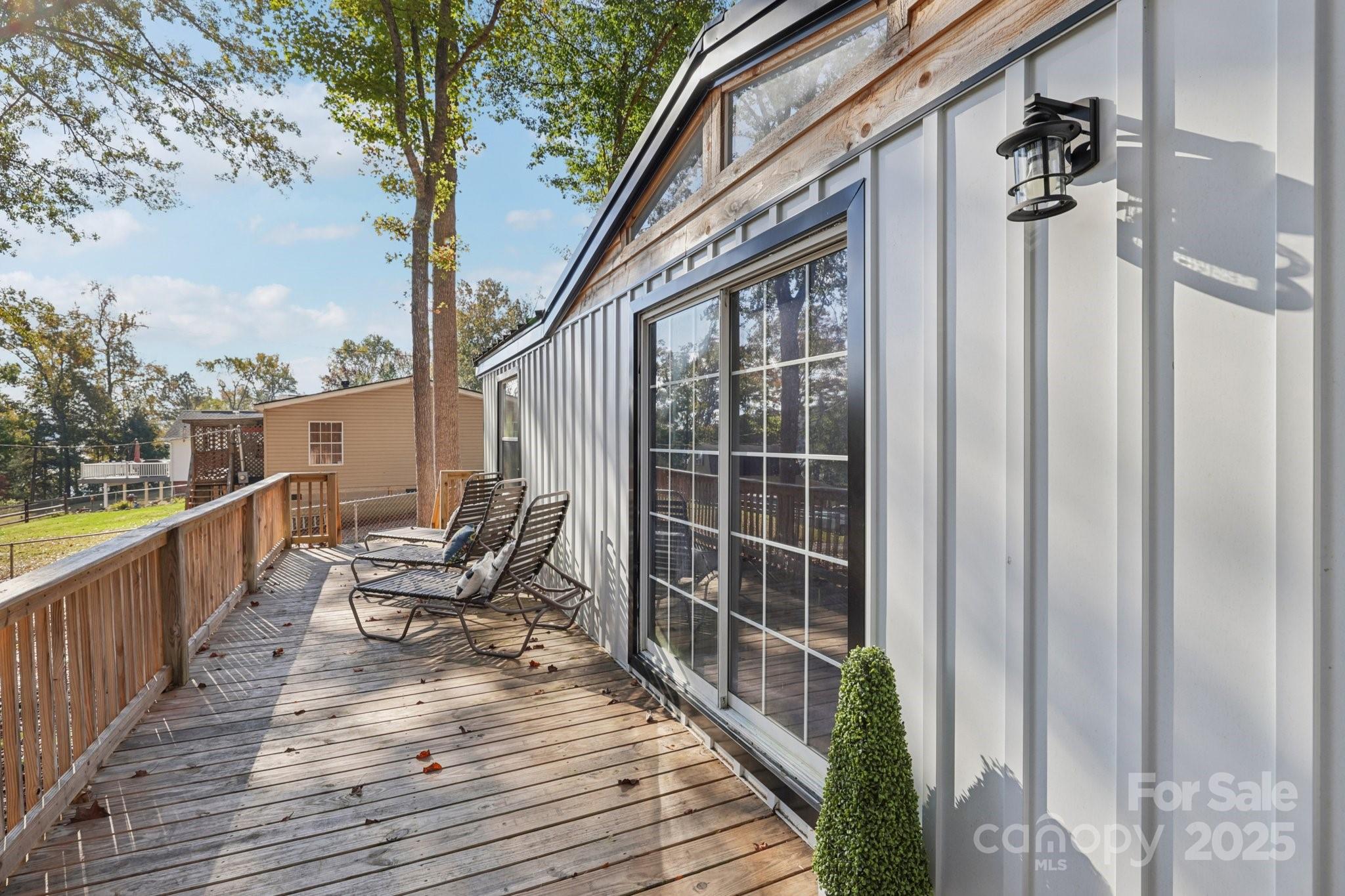 1269 Eastcreek Road Fort Lawn, SC 29714 - Photo 27 of 44 a balcony with wooden floor and outdoor seating