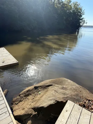 a view of lake with green space