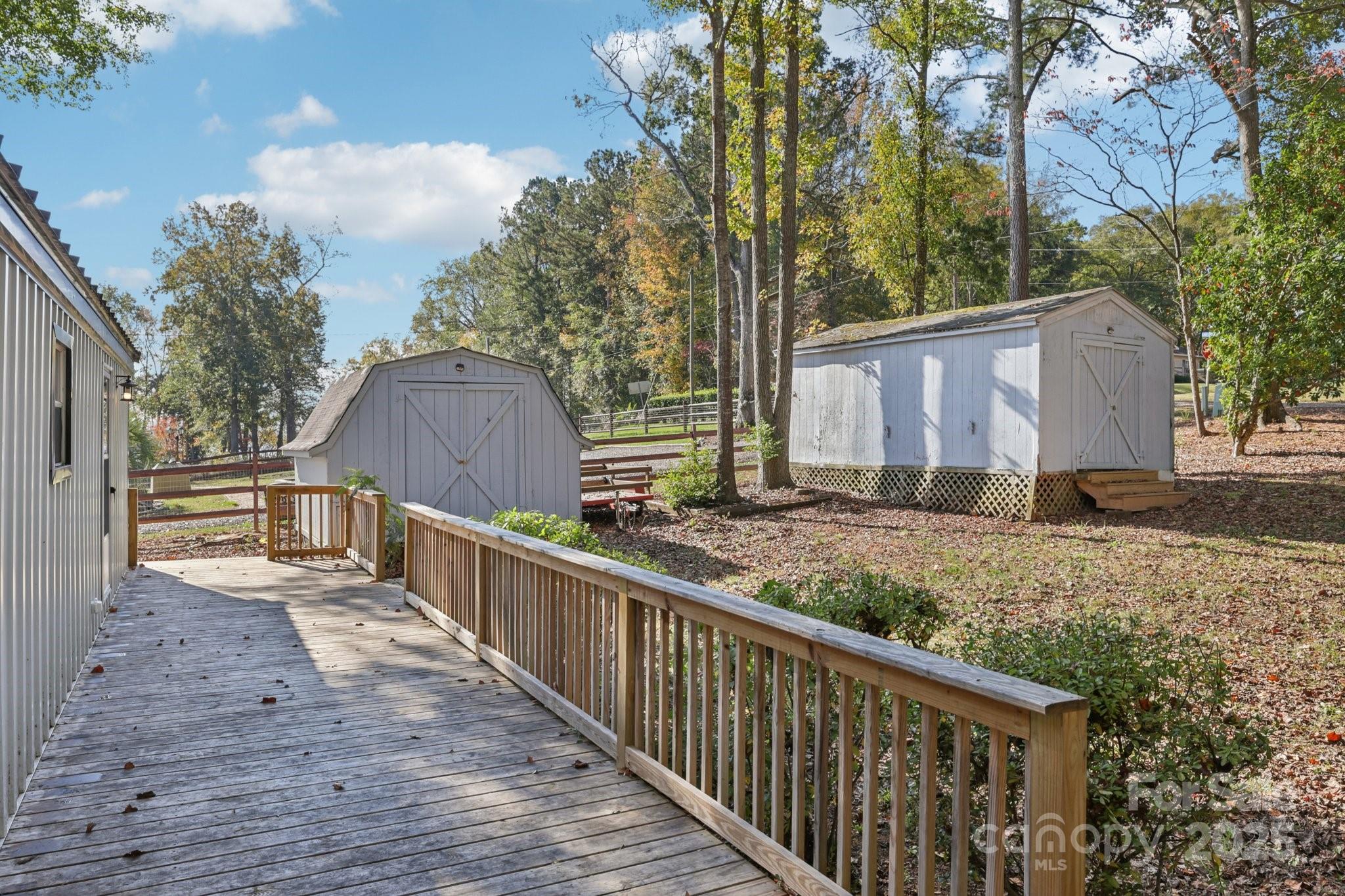 1269 Eastcreek Road Fort Lawn, SC 29714 - Photo 6 of 44 a view of a house with backyard and trees