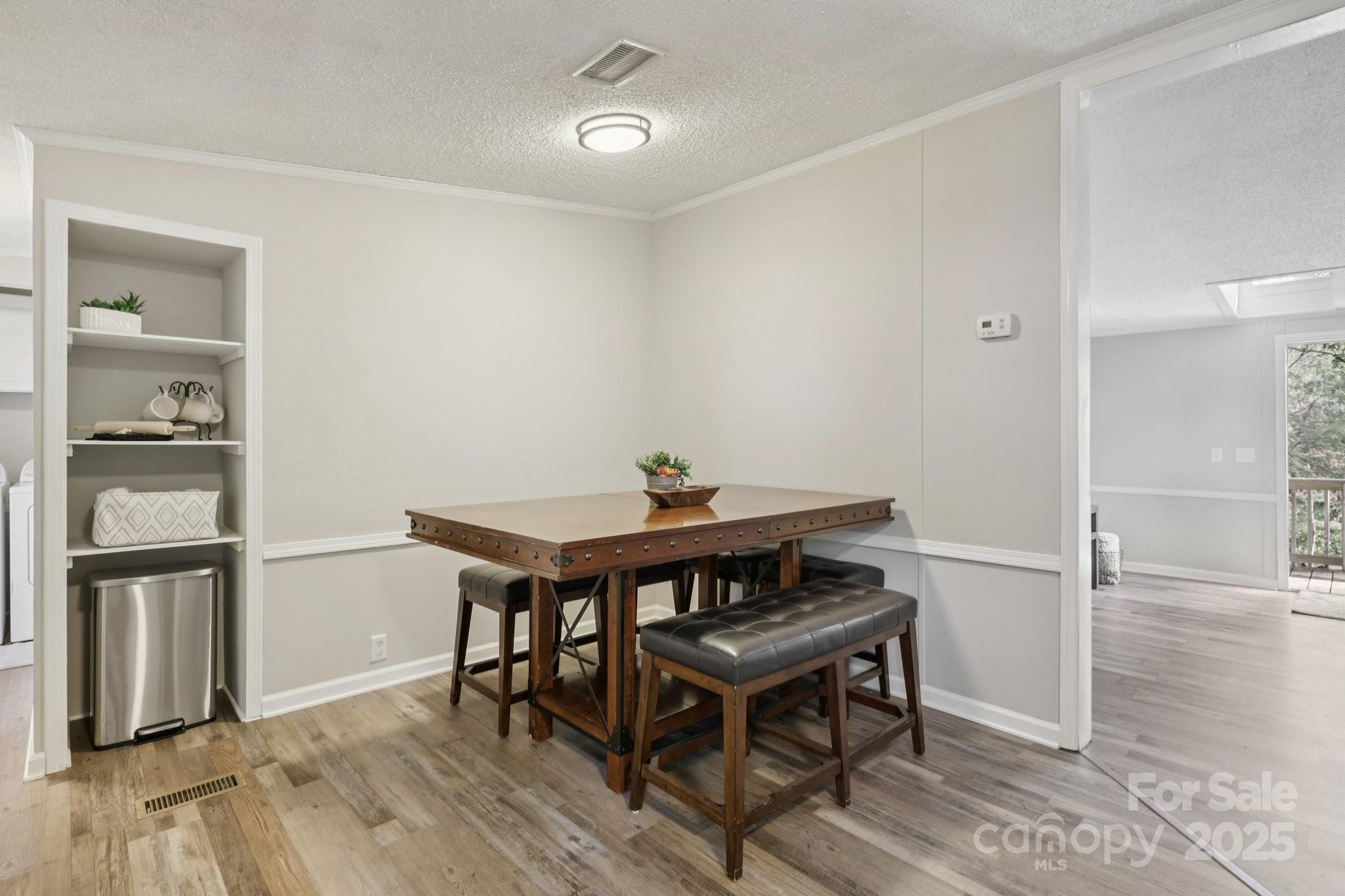 1269 Eastcreek Road Fort Lawn, SC 29714 - Photo 8 of 44 a view of a dining room with furniture and wooden floor