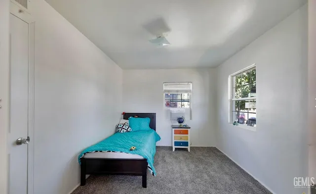 a room with furniture and window