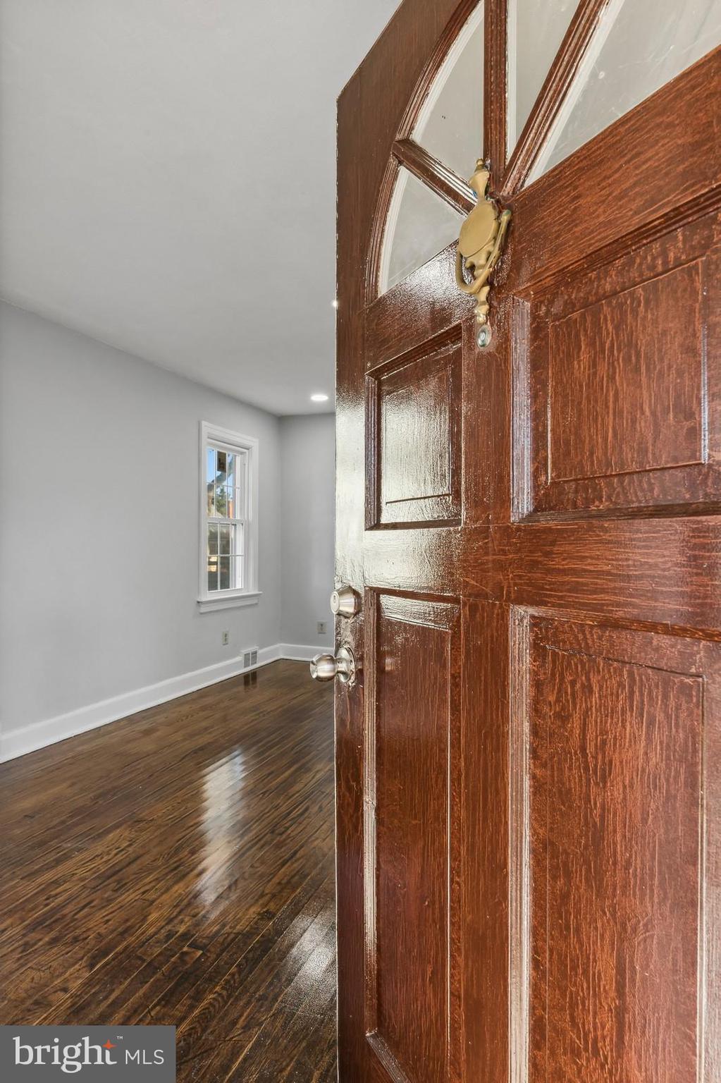 641 Concord Circle Ewing, NJ 08618 - Photo 2 of 3 a view of empty room with wooden floor and fan