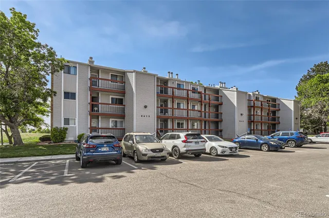 a car parked in front of a building