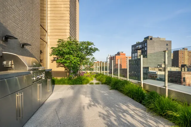 a view of a city with tall buildings