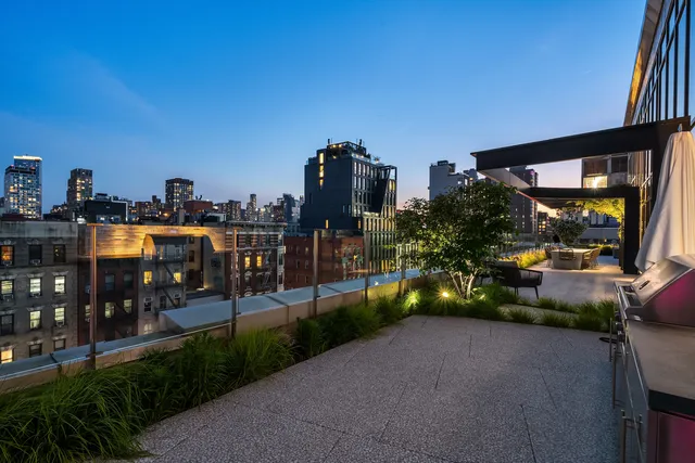 a outdoor space with patio furniture and a potted plant