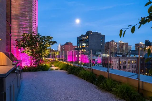 a view of swimming pool with outdoor seating and a patio
