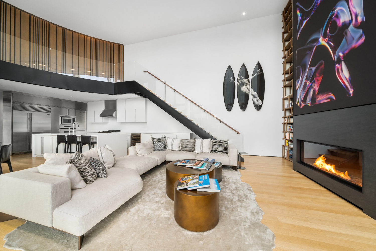 1 Avenue B, Unit PH1 Manhattan, NY 10009 - Photo 3 of 30 a living room with furniture and a fireplace