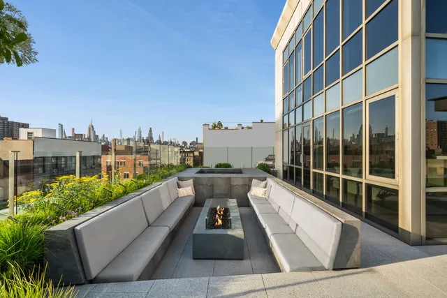 a view of balcony with furniture