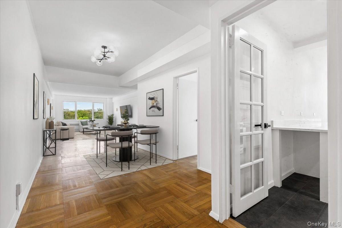 900 Palmer Road, Unit 10D Bronxville, NY 10708 - Photo 3 of 18 a view of a livingroom with furniture and a window