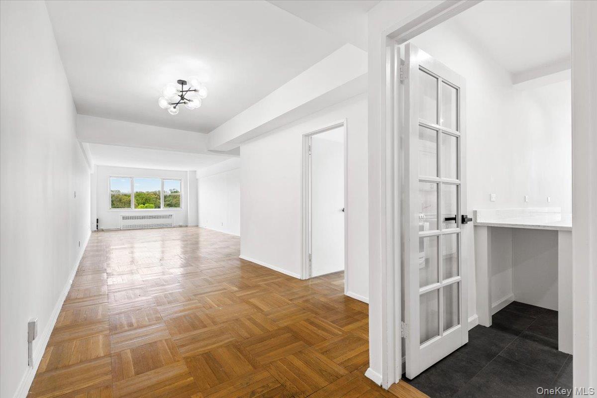 900 Palmer Road, Unit 10D Bronxville, NY 10708 - Photo 4 of 18 a view of an entryway with wooden floor