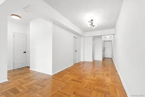a view of a livingroom with a ceiling fan